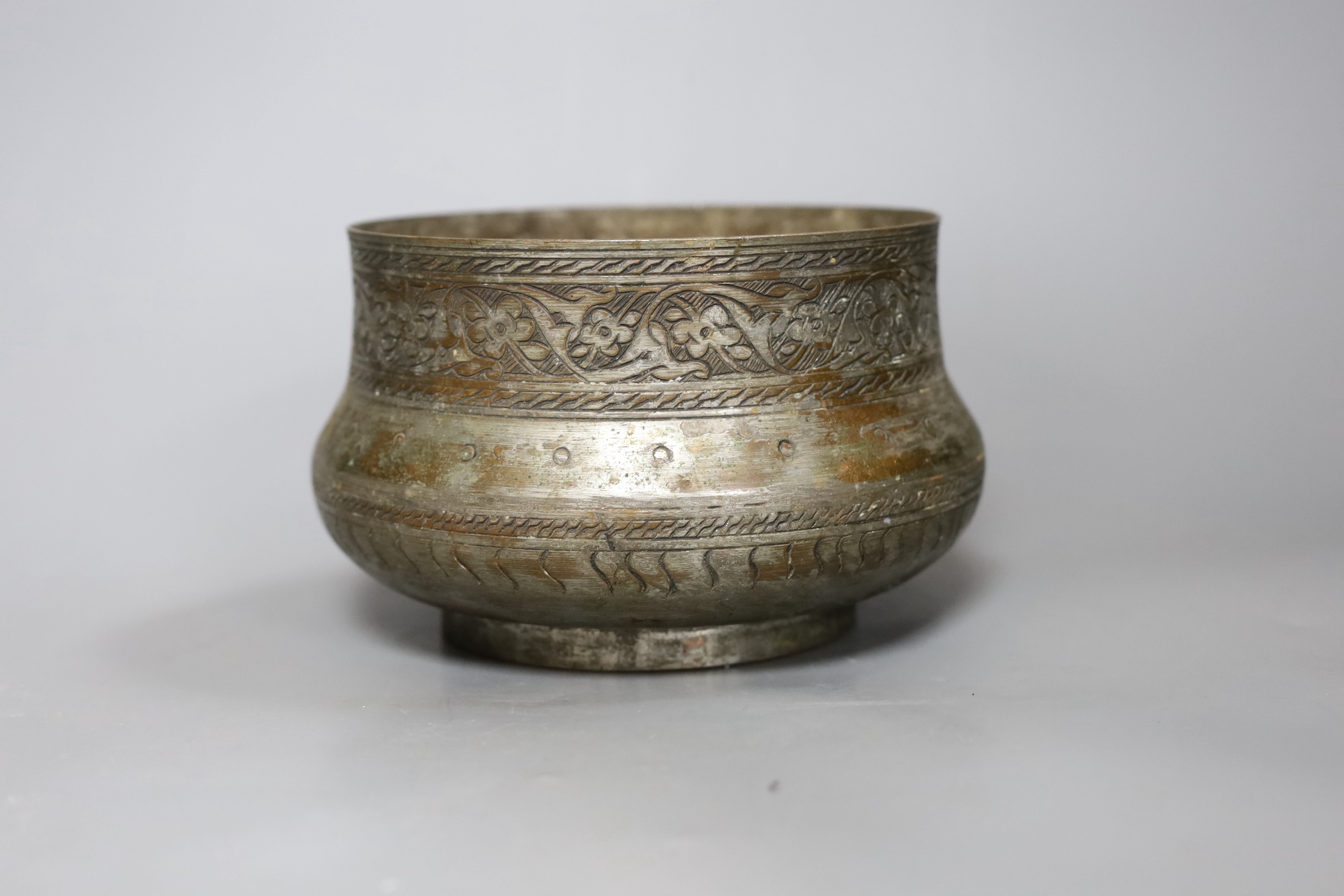 An Islamic tinned copper bowl, circa 1900, Tughra mark to base. 19cm